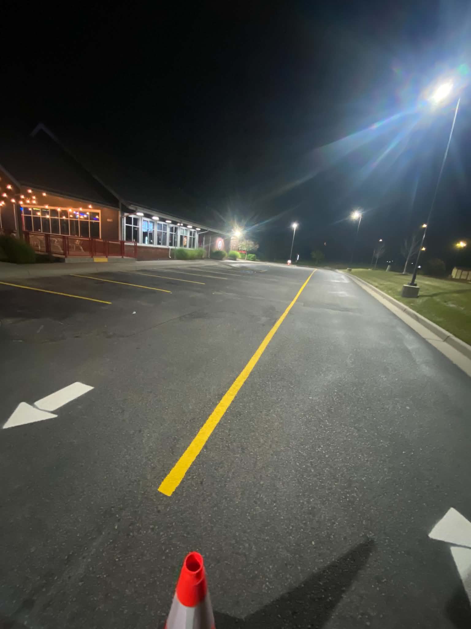 Directional pavement marking completed by Scherer Line